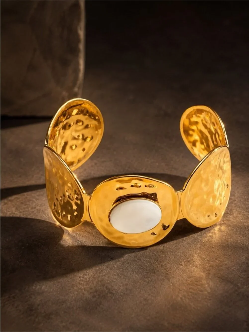 Gold Tone Cuff Bracelet with White Mother-of-Pearl Center
